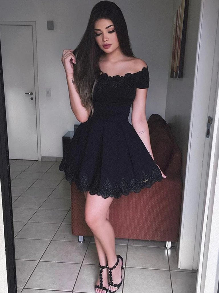 GLOSSY - lace black dress with ruffles on the shoulders